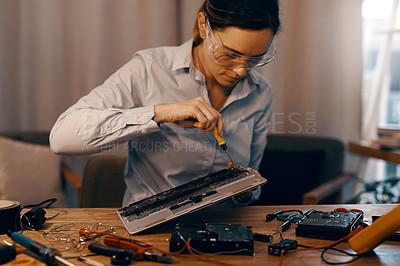 Buy stock photo Computer, technician and woman repairing motherboard, IT management and hardware engineer with screwdriver. Technology, fixing semiconductor and circuit board disassembly, safety goggles and working