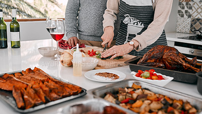 Buy stock photo Cropped shot of a couple preparing a Thanksgiving meal at home