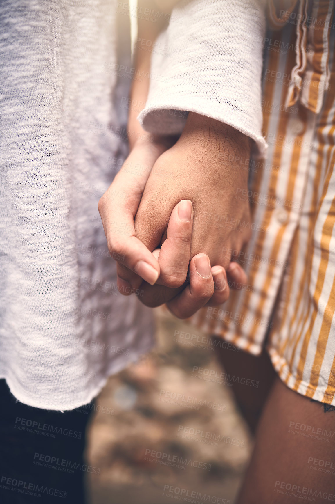 Buy stock photo Holding hands, love and couple with unity outdoor for romantic date together on vacation. Care, travel and closeup of man and woman with connection on honeymoon trip for marriage bonding together.