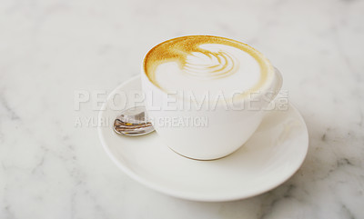 Buy stock photo Closeup shot of a cup of coffee on a counter