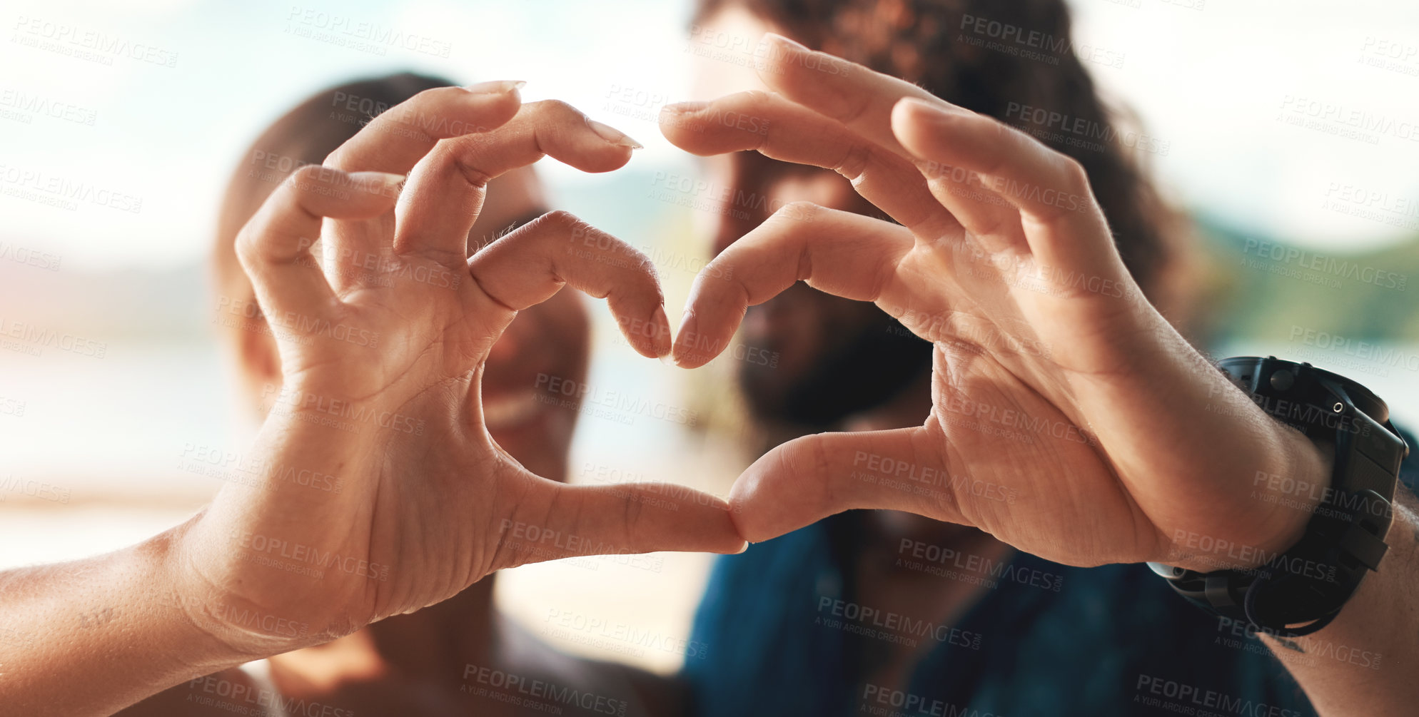 Buy stock photo Couple, hands and heart with smile, happy and love for together, bonding and romance in outdoor. Woman, man and shape for honeymoon, vacation or holiday in summer for weekend, getaway and adventure