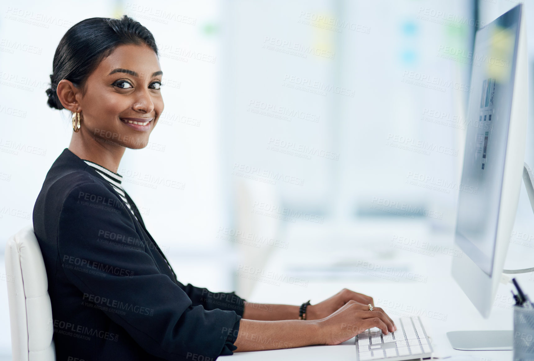 Buy stock photo Computer, business and portrait of Indian woman typing email, report or writing information in office. Smile, face and professional consultant on keyboard, entrepreneur or employee research online