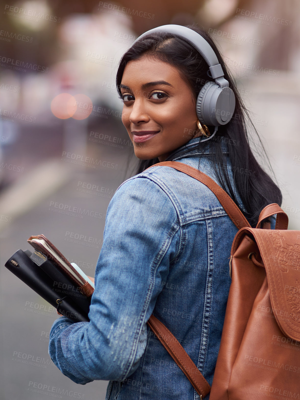 Buy stock photo Travel, books and portrait of student with headphones for morning, journey or music on commute to lecture. University, Indian girl and smile with technology for education, learning or audio streaming