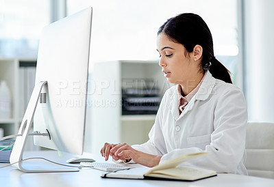 Buy stock photo Science, notebook and woman with computer typing medical study, online report or results. Website, writing and review for scientist, lab technician or research for pharmaceutical test in laboratory