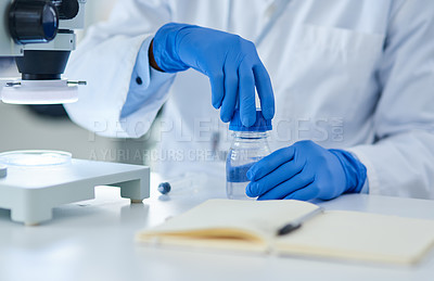 Buy stock photo Hands, scientist and glass tube in laboratory with notebook for test, experiment and liquid sample. Person, gloves and ppe for medical research at pharma company with assessment, gear and container