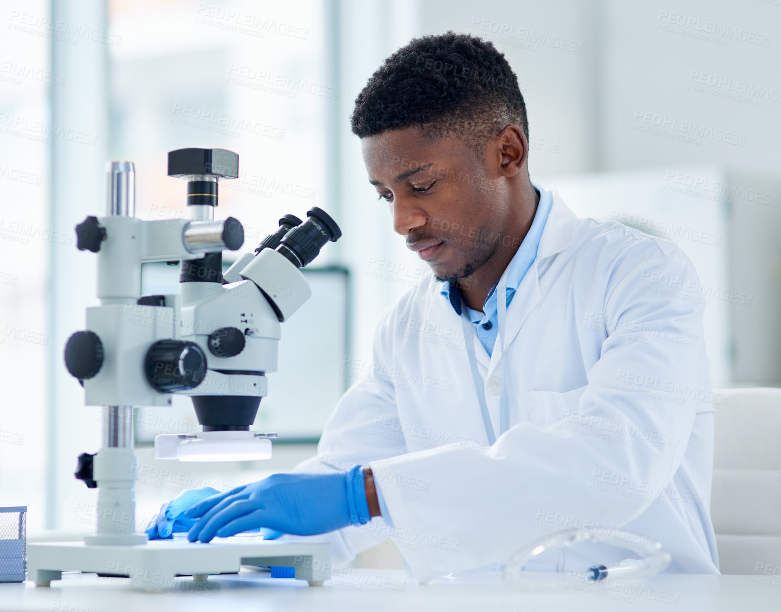 Buy stock photo Black man, scientist and microscope for analysis, testing and study vaccine results or solution. Lens, doctor and male person for forensic exam in lab or pharma, biotech and innovation in medicine
