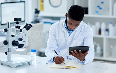 Buy stock photo Science, researcher and black man writing, tablet and notes for experiment and test scores with connection. Laboratory, African person and expert with tech and online reading with review and feedback