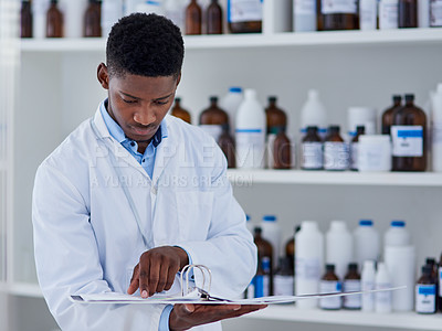 Buy stock photo Folder, science and black man reading in laboratory, research and information for experiment. Doctor, expert and employee with document and file with test review, idea and feedback with medical notes