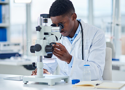 Buy stock photo Science, notes and black man with microscope for research, investigation or medical engineering in laboratory. Biotech, lab technician or scientist checking vaccine sample for pharmaceutical test.