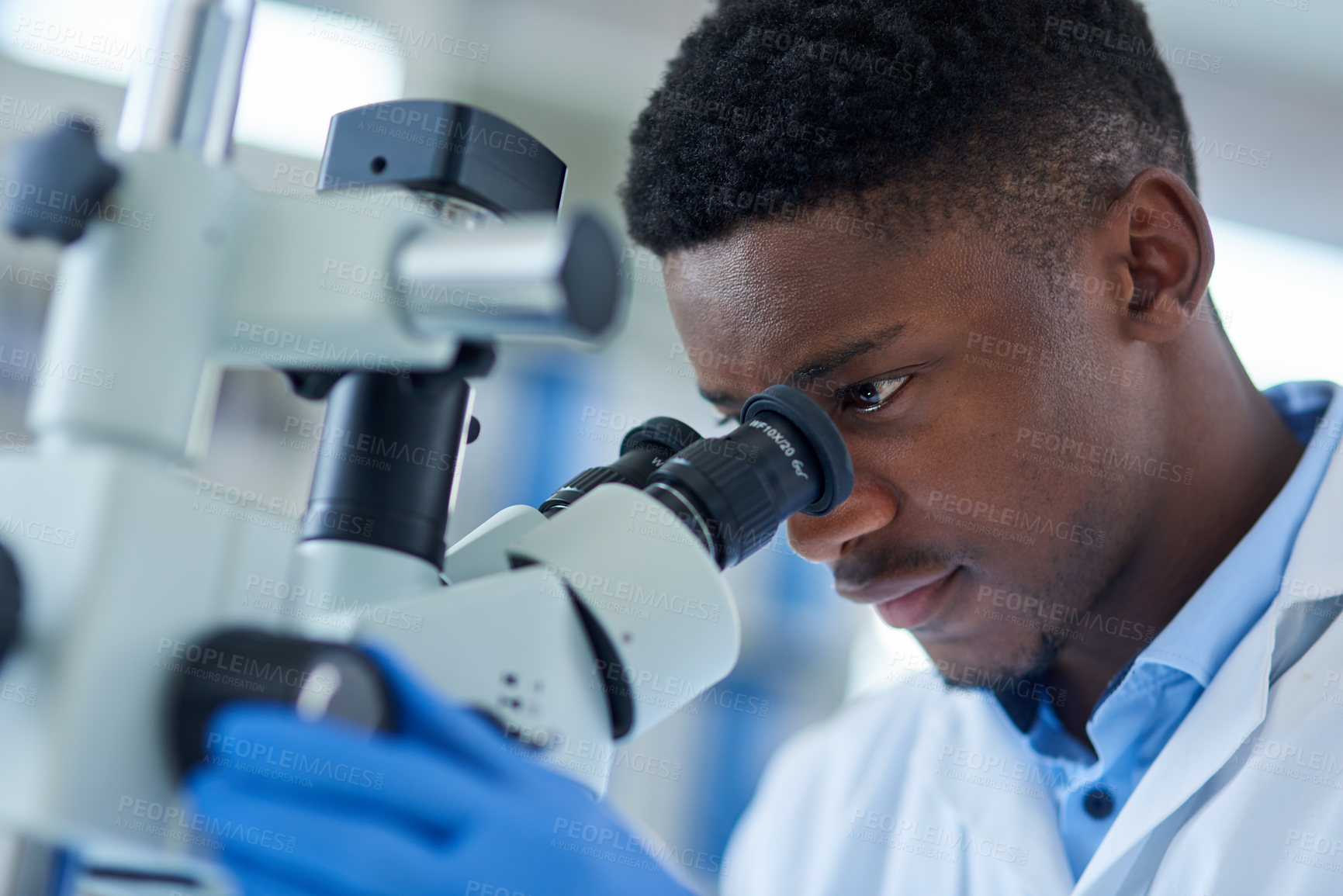 Buy stock photo Black man, scientist and microscope for research, testing and study vaccine results or solution. Lens, doctor and male person for forensic exam in lab or pharma, biotech and innovation in medicine