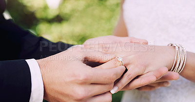 Buy stock photo Hands, wedding ring and marriage with commitment for love, event with jewellery for bride. Couple, people and together with symbol for loyalty on partners finger, outdoor with care in Chicago