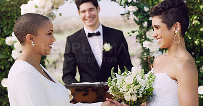 Buy stock photo Love, happy and lgbtq with lesbian couple at wedding for celebration, gay and pride. Smile, spring and happiness with women at ceremony event for partner commitment, queer romance and freedom