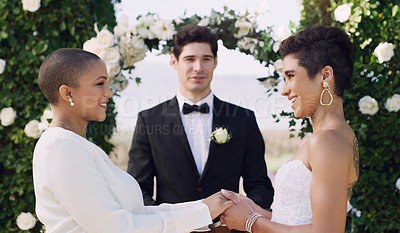 Buy stock photo Love, wedding and lgbtq with lesbian couple holding hands for celebration, happy and pride. Gay, spring and marriage ceremony with women at event for commitment, queer sexuality and freedom