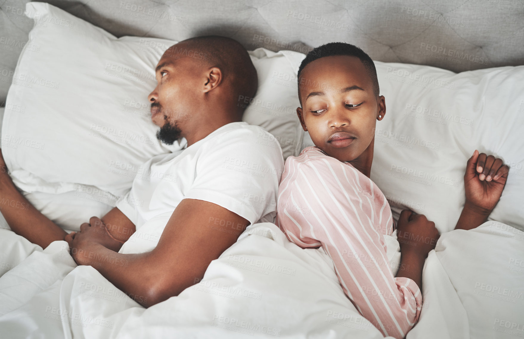 Buy stock photo Fight, marriage and black couple in bed angry from fight in bedroom feeling frustrated from conflict. Woman, man and anger of people in a home with sleeping problem from divorce or seperation