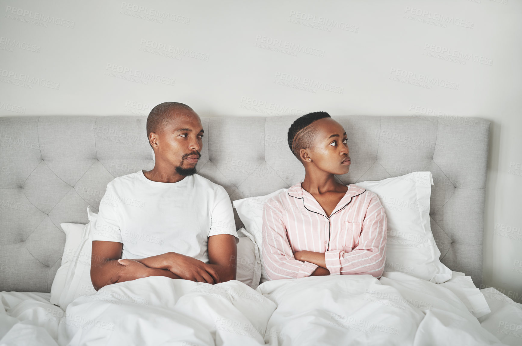 Buy stock photo Stress, fight and black couple lying in bed angry, affair and divorce argument or insomnia. Mental health, relationship and depression, woman ignoring man frustrated with sexual problem in bedroom.