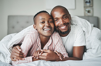Buy stock photo Black people, hug and smile in portrait with love and care at home, relax and commitment with healthy relationship. Happy couple in bed, partnership and trust with loyalty, support with peace