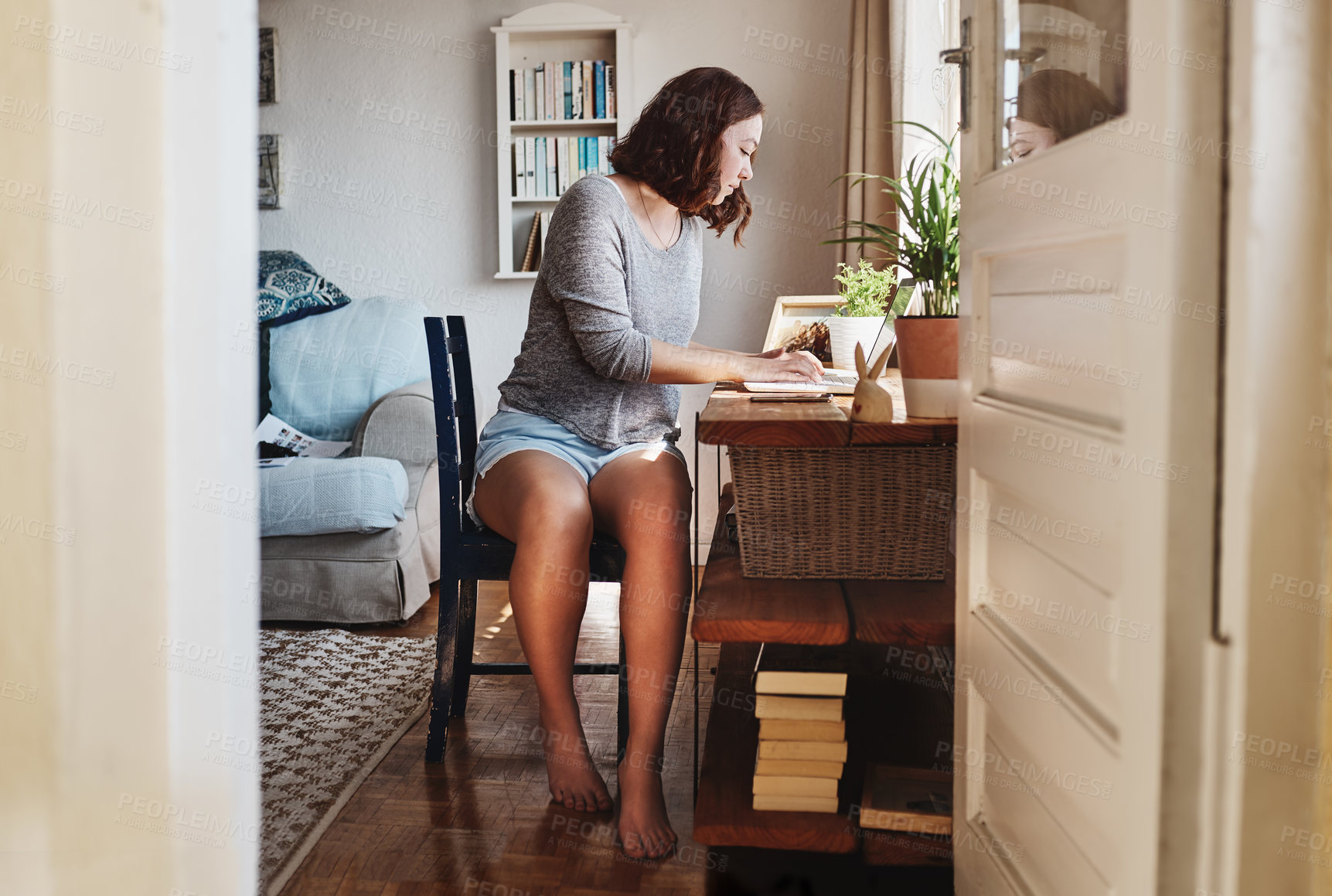 Buy stock photo Woman, relax and typing with laptop in home with reading, notification and email on web in morning. Person, computer and writer with remote work, project and review for creative career at apartment