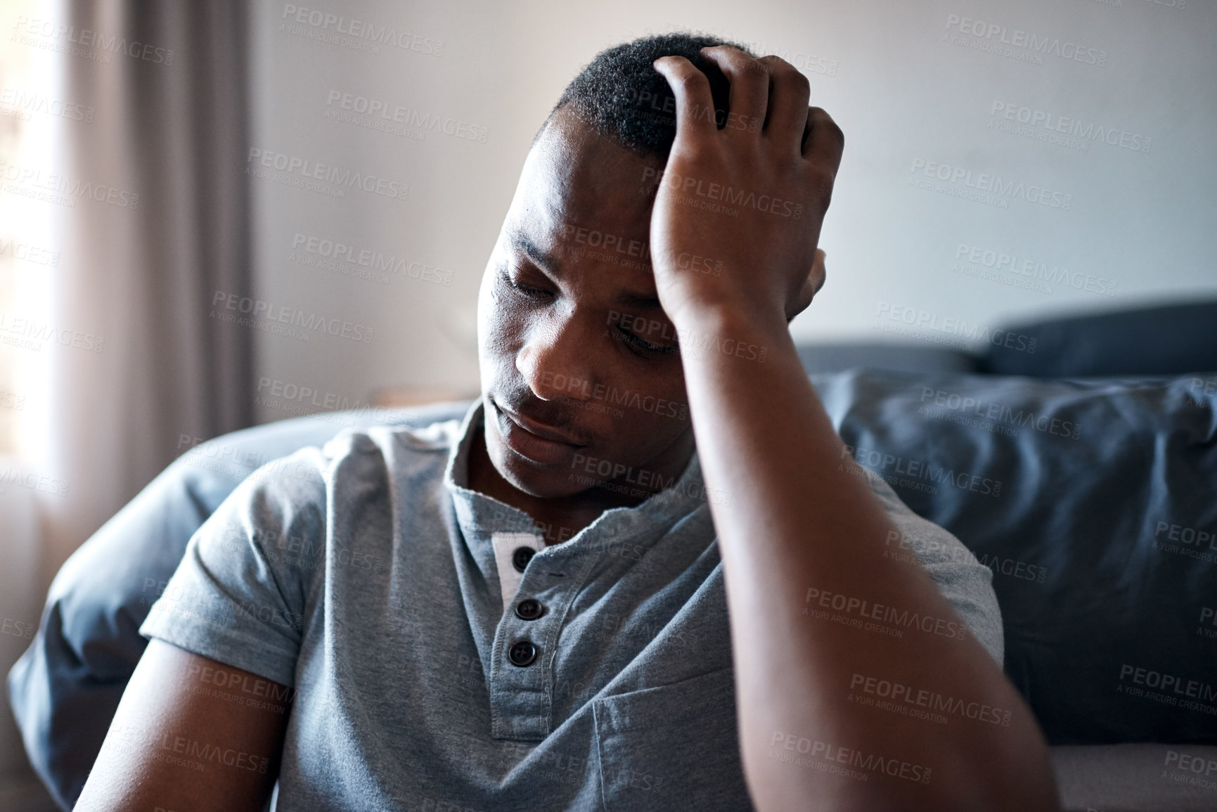 Buy stock photo Bedroom, tired or black man with depression for insomnia, stress or sad after break up at home. Male person, trauma or frustrated with headache for relationship crisis, anxiety or heartbreak in house