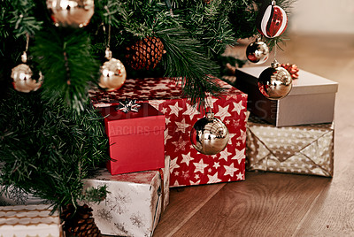 Buy stock photo Christmas, celebration and present by tree on floor for decoration, happiness and festival tradition. Holiday, vacation and festive gifts under Christmas tree ready to open in morning with no people