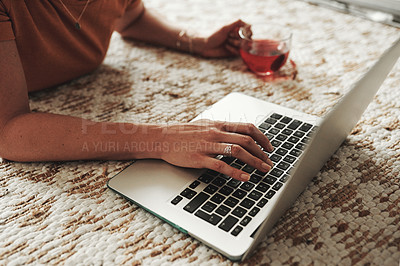 Buy stock photo Hands, typing and laptop on floor for internet, blog and relax in morning or living room. keyboard, technology and woman in home for networking, social media and online app for email or ebook