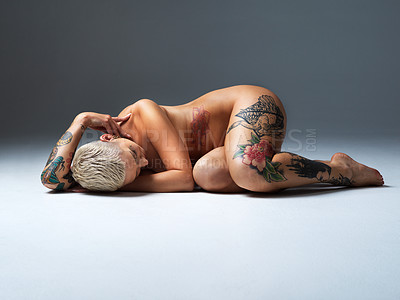 Buy stock photo Full length shot of a beautiful young woman posing nude in the studio
