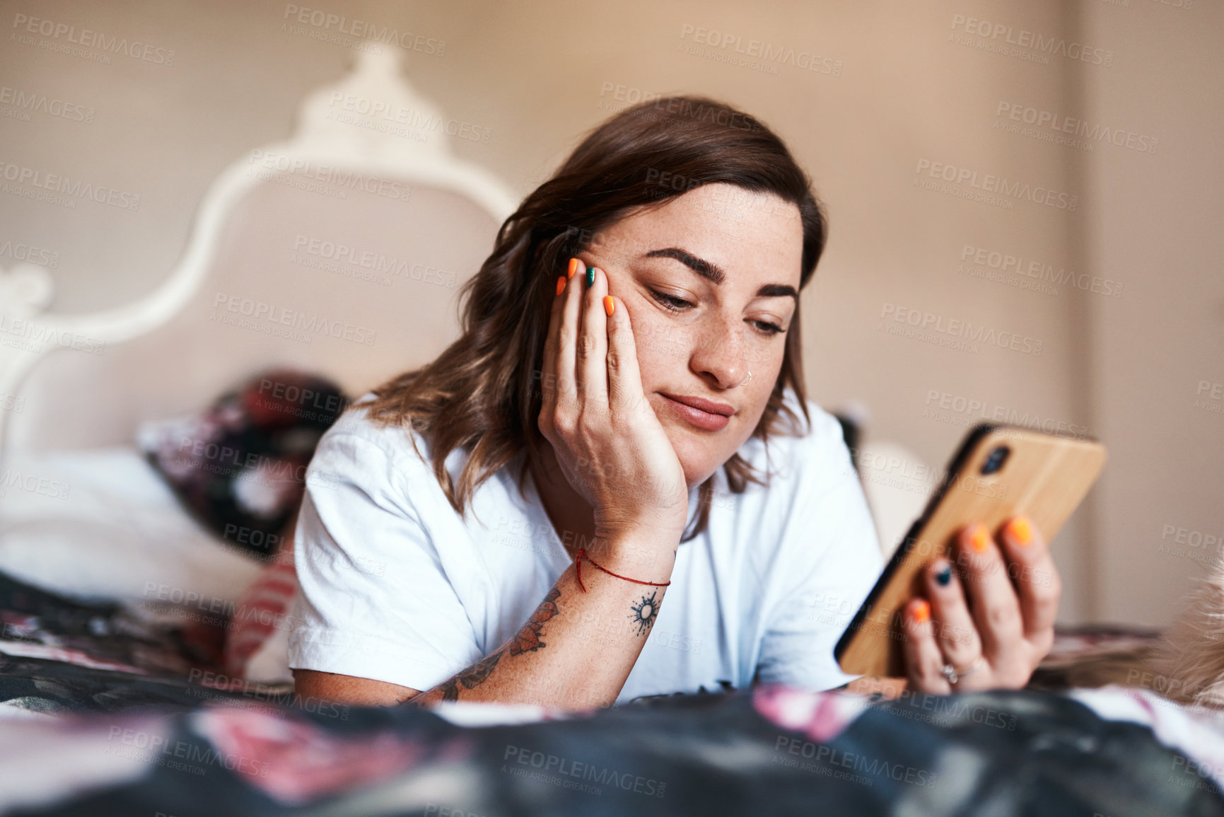 Buy stock photo Bedroom, woman and reading with smartphone for chat, text message and digital with online partner. Home, female person and cellphone with mobile app for dating website, connection and social media