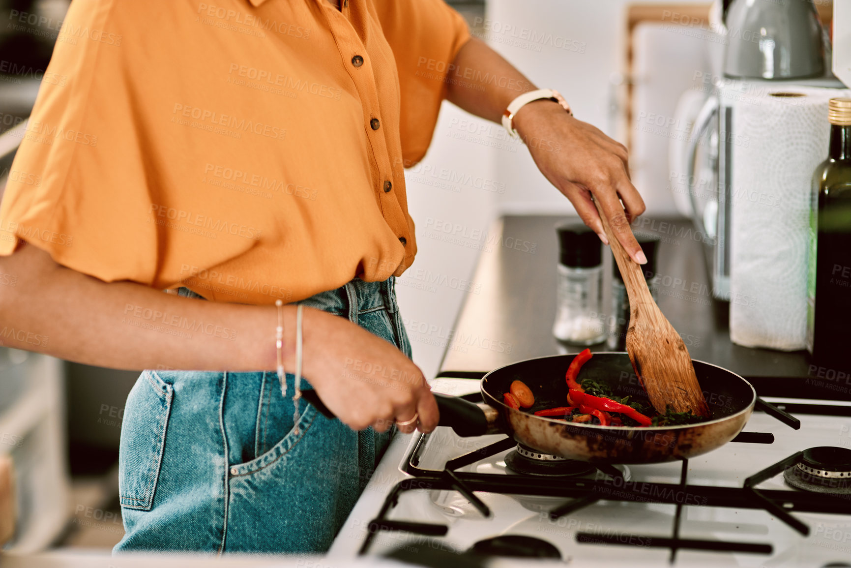 Buy stock photo Kitchen, closeup and woman hands cooking with a pan for lunch, dinner or supper in apartment. Nutrition, and female person preparing healthy, vegetarian or diet food or meal on the stove in her home.