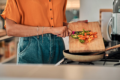 Buy stock photo Hands, cooking and woman with vegetables in kitchen for health, wellness and diet meal for dinner. Food, nutrition and female person preparing lunch or supper with produce ingredients at home