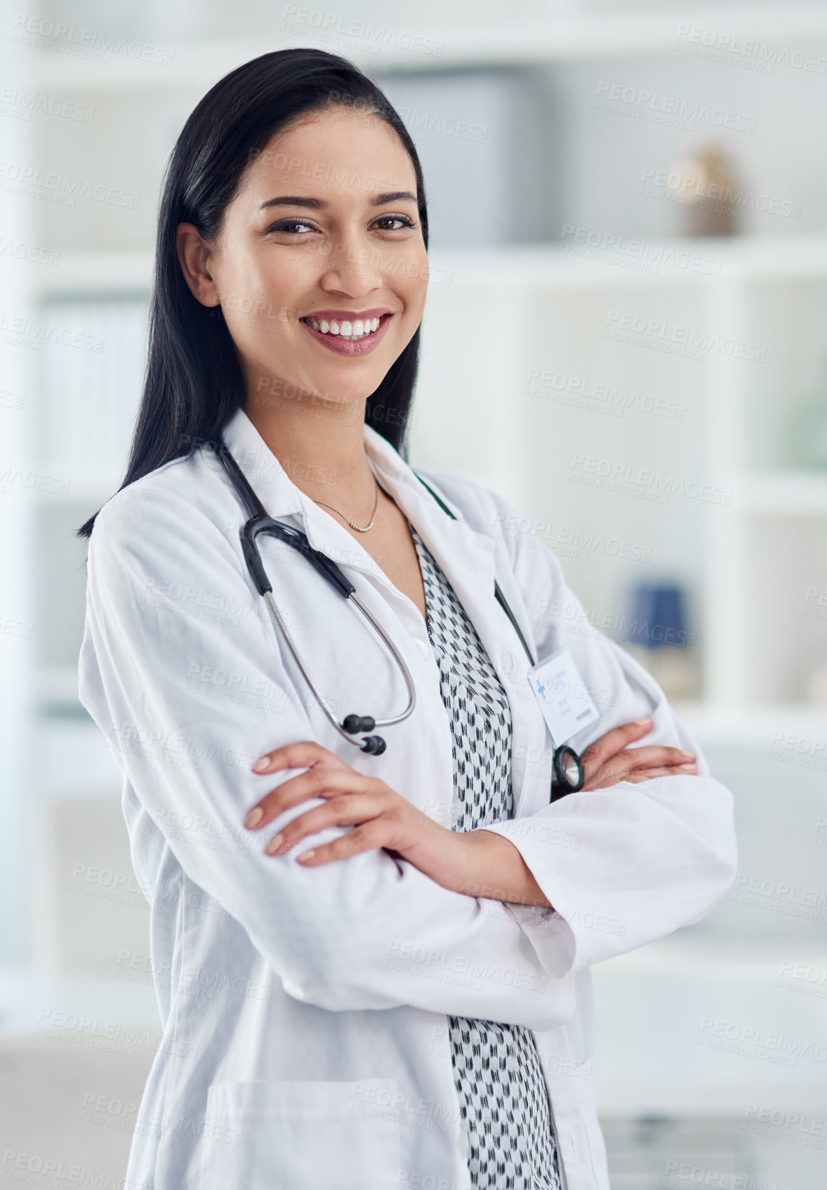 Buy stock photo Portrait of a confident young doctor working in a clinic