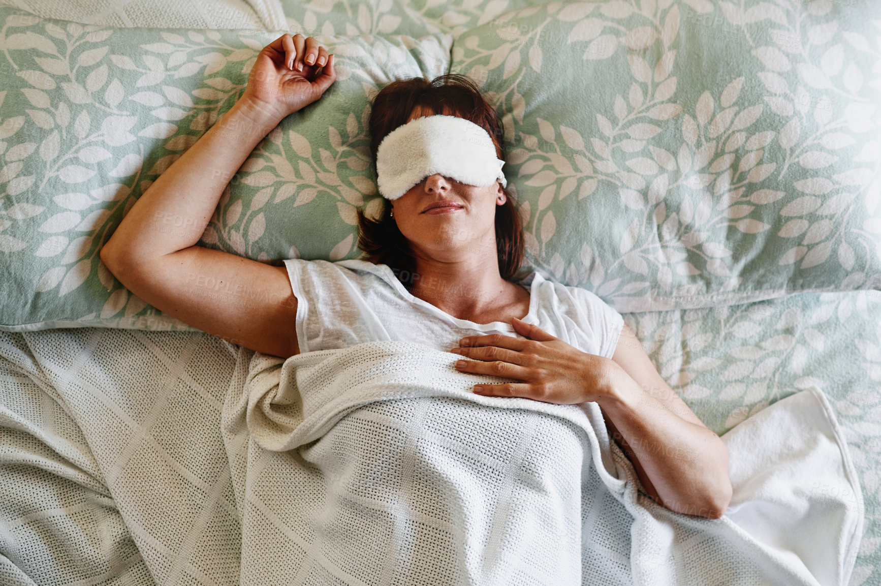 Buy stock photo Woman, top view and mask for sleeping in bed, resting and rejuvenate body or mind on weekend in home. Female person, above and blanket to relax in bedroom, dream and nap for self care on Sunday