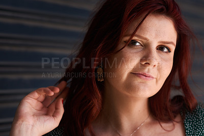 Buy stock photo Woman, portrait and smile at wall with confidence, skincare and natural beauty in Ireland. Female person, happy and positive attitude by garage door with red hair, style or satisfaction for hairstyle