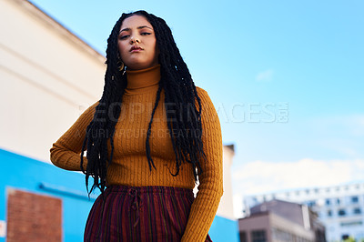 Buy stock photo Cropped shot of a beautiful young woman out in the city during the day