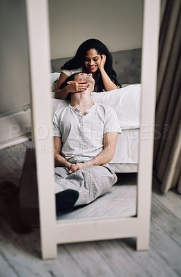 Buy stock photo Couple, relax or love in mirror on bed with affection, romance or conversation for bonding in home. People, reflection or happy in relationship with talking, connection and support with trust or care