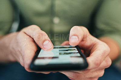 Buy stock photo Cropped shot of an unrecongnizable businessman sitting alone in the office and texting on her cellphone