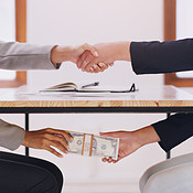 Corruption under the tables | Buy Stock Photo on PeopleImages, Picture ...