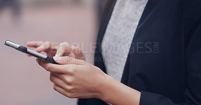 Buy stock photo Hands, phone and business woman in city for closeup texting, networking or email communication on internet. Businesswoman, smartphone and typing in metro street with social media app, chat or contact