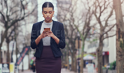 Buy stock photo Outdoor, business and woman with a smartphone, typing and social media with website information and mobile app. Female person, employee or consultant with a cellphone, city or search internet outdoor
