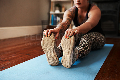 Buy stock photo Closeup shot of a woman exercising at home