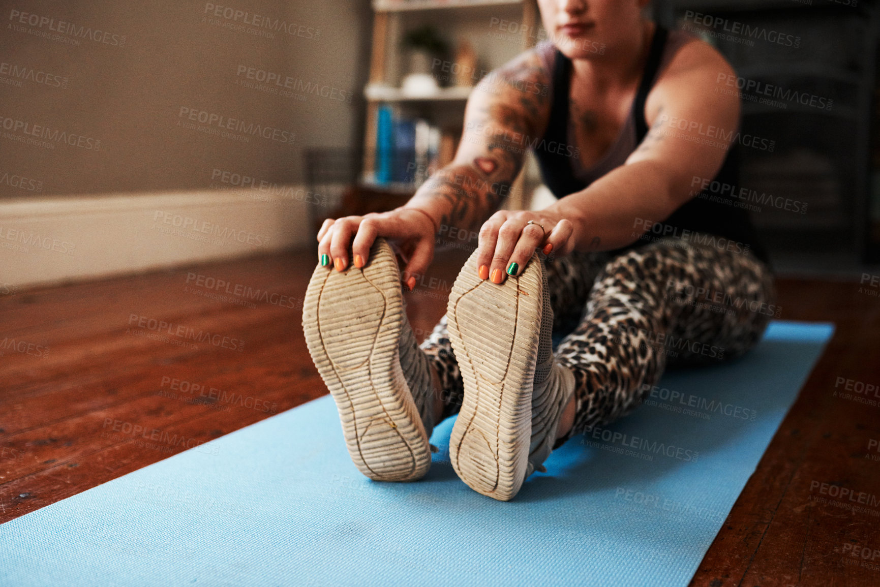 Buy stock photo Closeup shot of a woman exercising at home