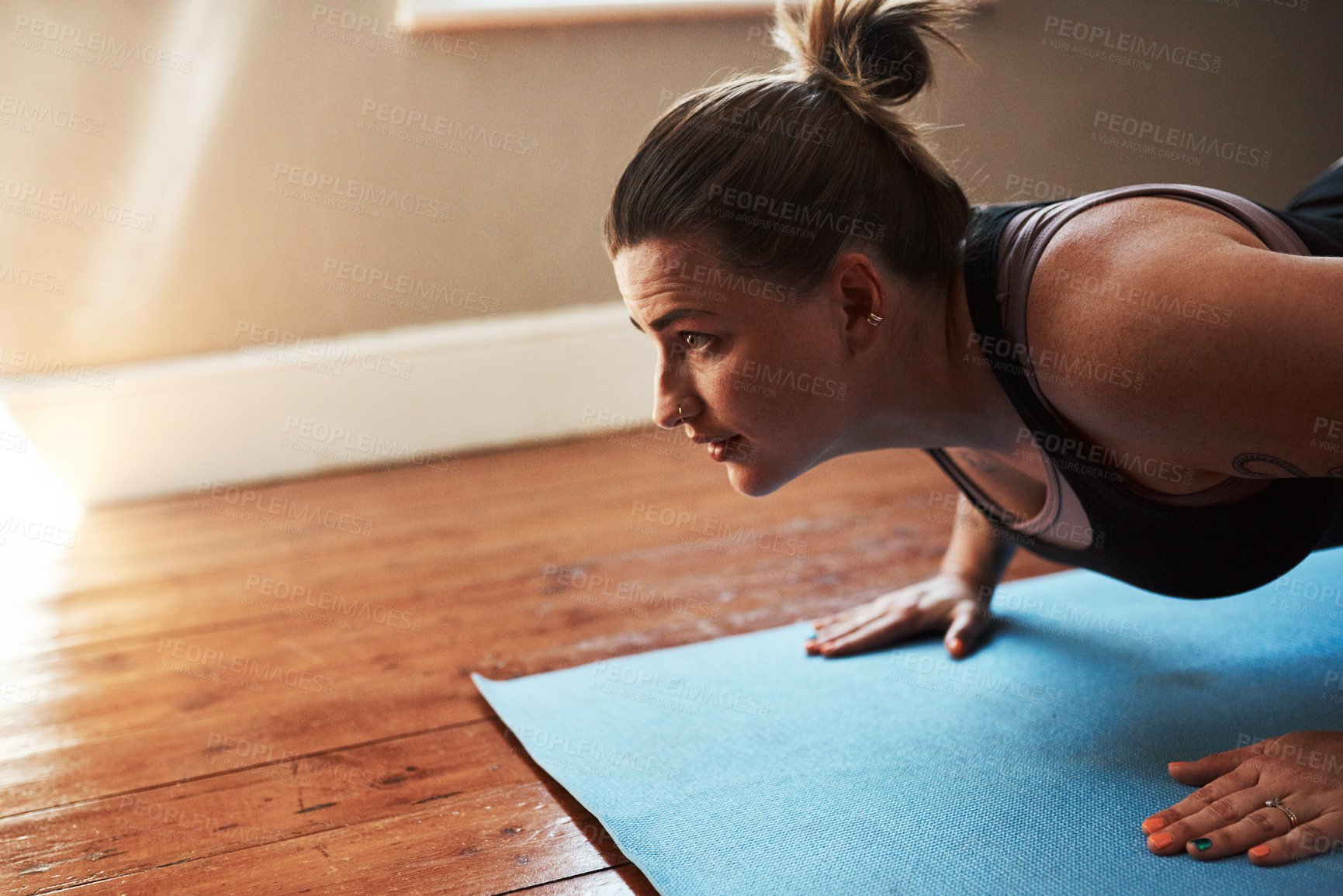 Buy stock photo Woman, push up and yoga with fitness at house for balance,  holistic exercise and mental health wellness. Girl, stretching and core strength with pilates peace, mindfulness and spiritual performance