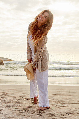 Buy stock photo Portrait of a young woman spending some time at the beach