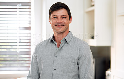 Buy stock photo Closeup shot of a man smiling while spending the day indoors