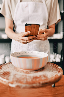 Buy stock photo Woman, picture and phone in studio for pottery, painting and creative website with art, screen and hand. Artist, smartphone and ceramics for small business, live streaming and video as online course