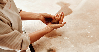 Buy stock photo Cropped shot of an unrecognizable artisan working in a pottery workshop