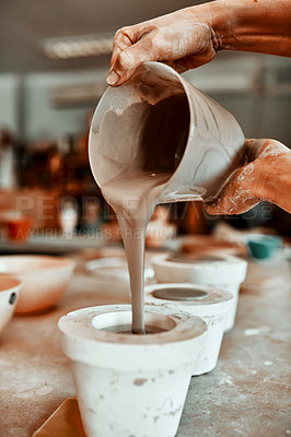 Buy stock photo Clay, mold and hands of person with pottery in workshop for small business, production and creativity. Art, potter and bucket with liquid in container for handmade craft, ceramics and manufacturing