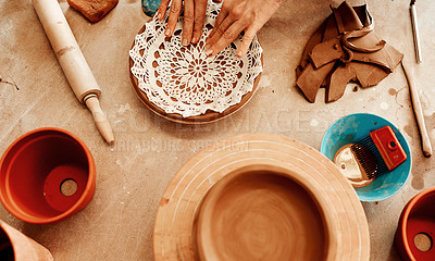 Buy stock photo Above, person and hands at pottery store with clay as artist for handmade manufacturing. Small business, skills and entrepreneur with tools or equipment for handicraft, creativity and design