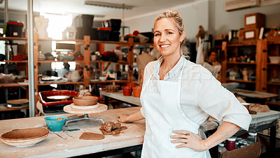 Buy stock photo Small business, woman and smile at pottery store with clay as artist for supply and manufacturing. Startup, female person and proud on portrait with tools or equipment for creativity and design