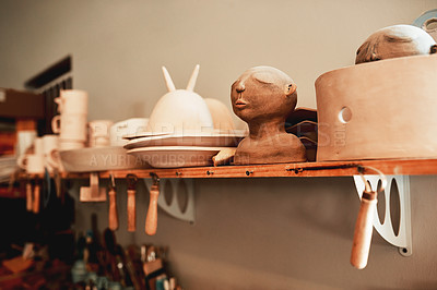Buy stock photo Cropped shot of handmade earthenware in a pottery workshop