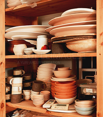 Buy stock photo Cropped shot of handmade earthenware in a pottery workshop
