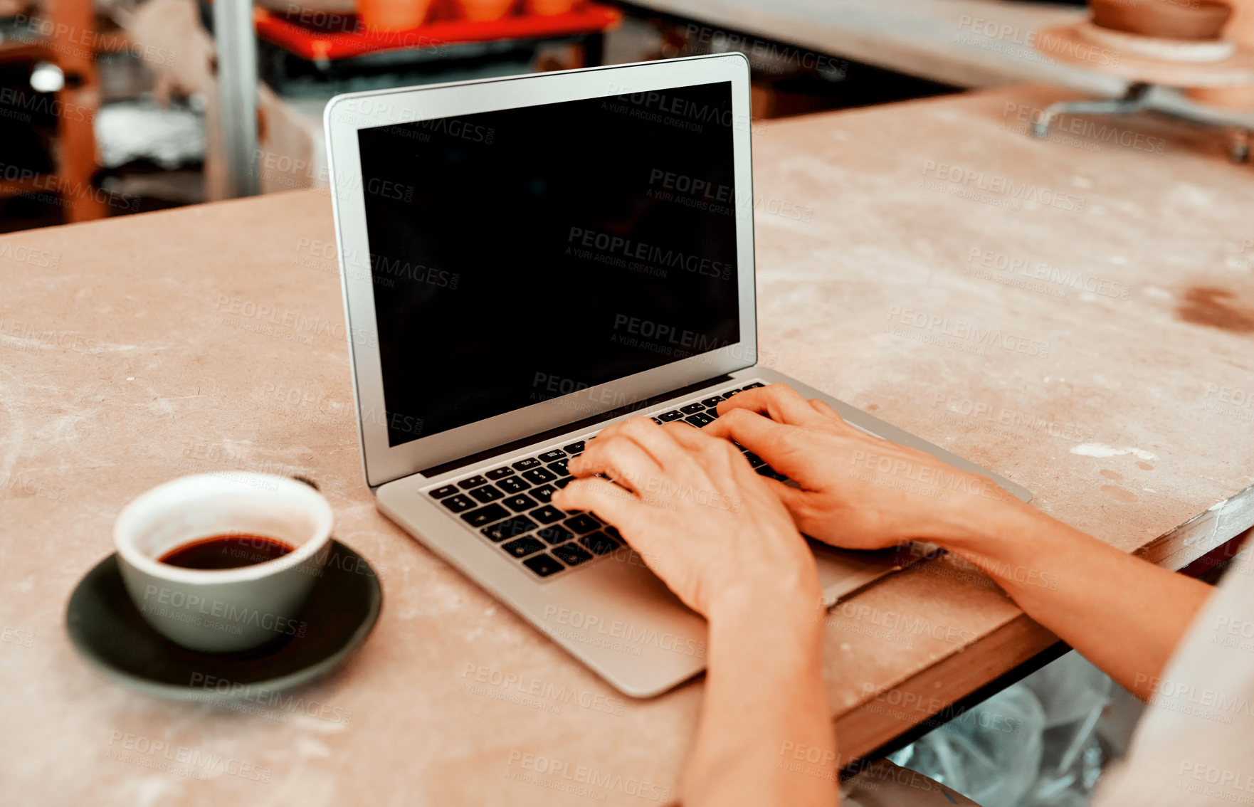 Buy stock photo Hands, laptop and person in pottery workshop with typing, email or contact supplier for material on web. Artist, entrepreneur and computer screen for stock, inventory and creative with mockup space